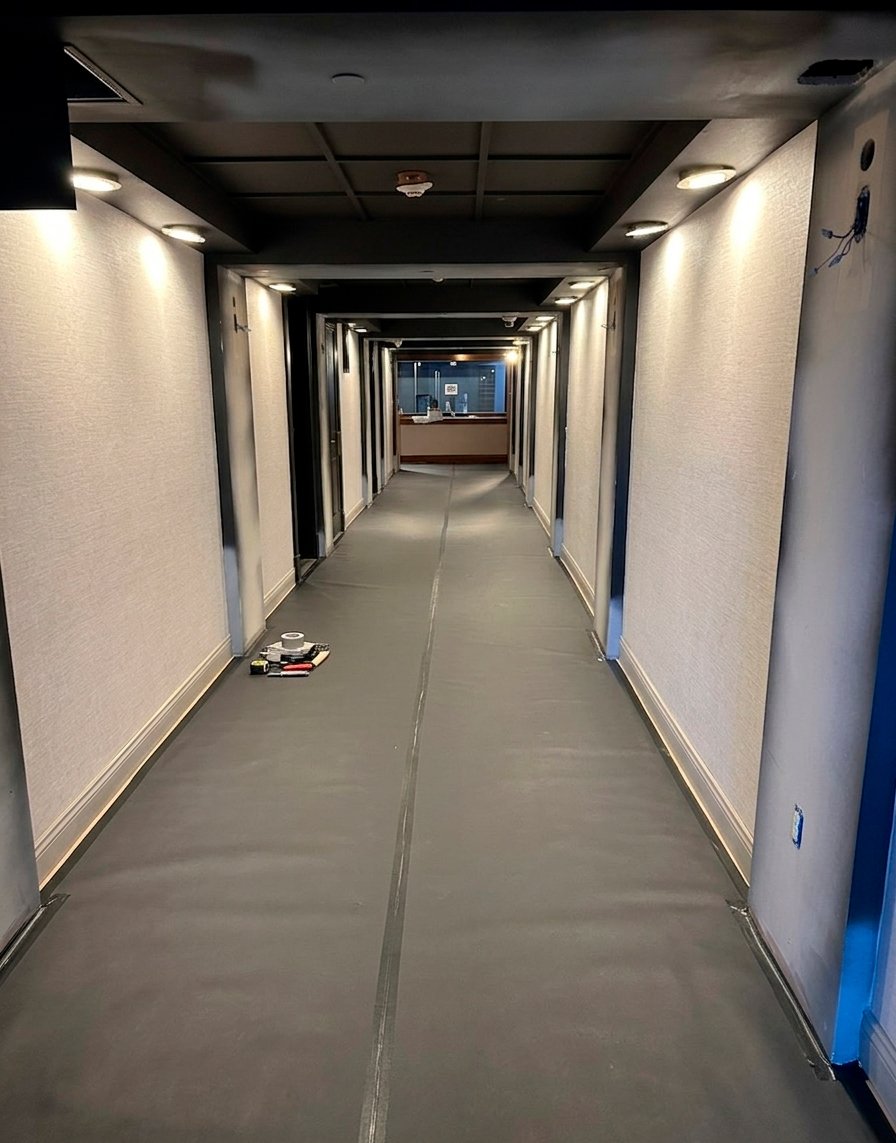Completed hallway with commercial vinyl wallcovering at Vail Mountain House hotel, Vail Colorado
